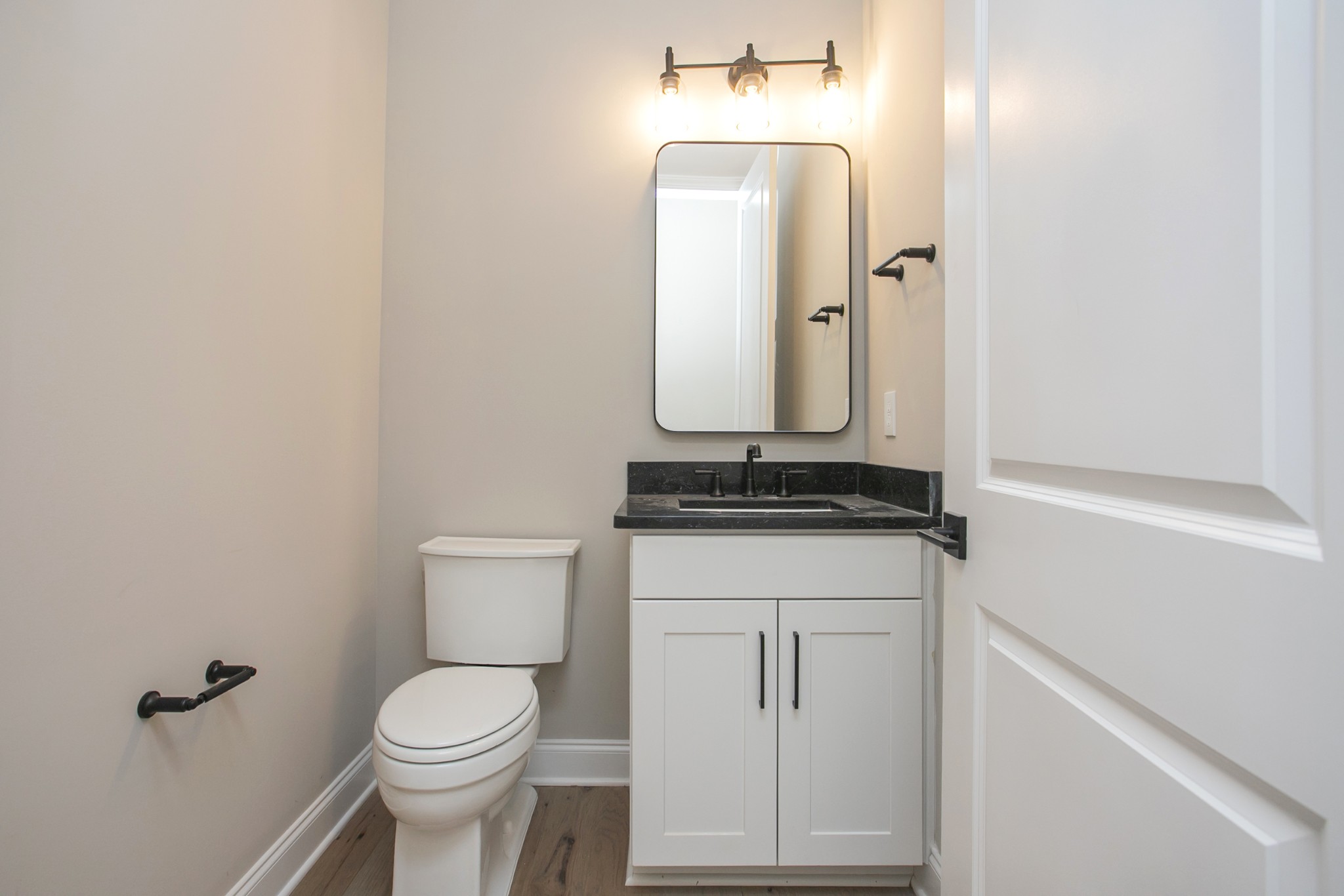 5956 Hunt Vly Drive Spring Hill, TN 37174 - Photo 26 of 53 a bathroom with a toilet sink and mirror