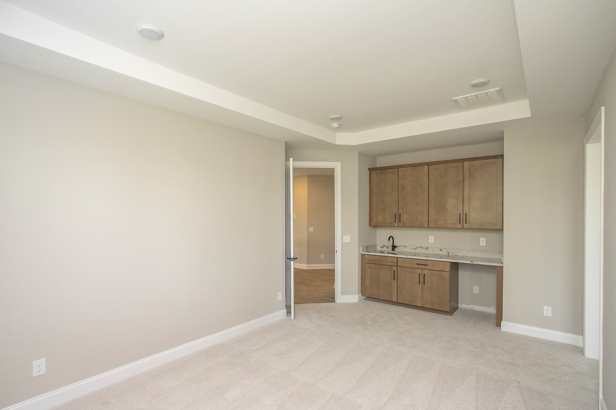 5956 Hunt Vly Drive Spring Hill, TN 37174 - Photo 33 of 53 a view of a kitchen with a sink and dishwasher cabinet