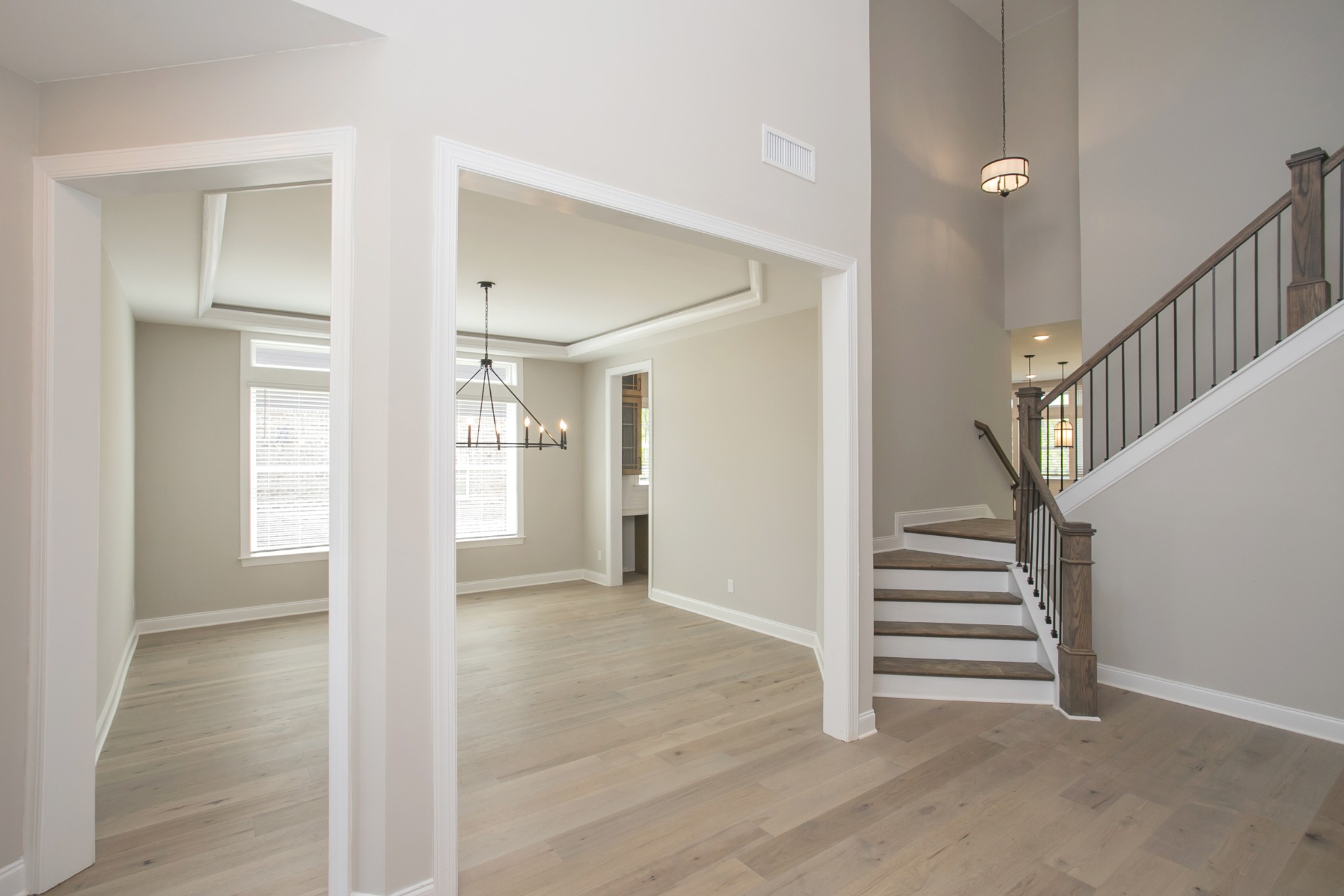 5956 Hunt Vly Drive Spring Hill, TN 37174 - Photo 8 of 53 a view of entryway with wooden floor and stairs