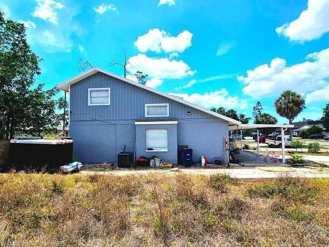 a view of swimming pool with a yard