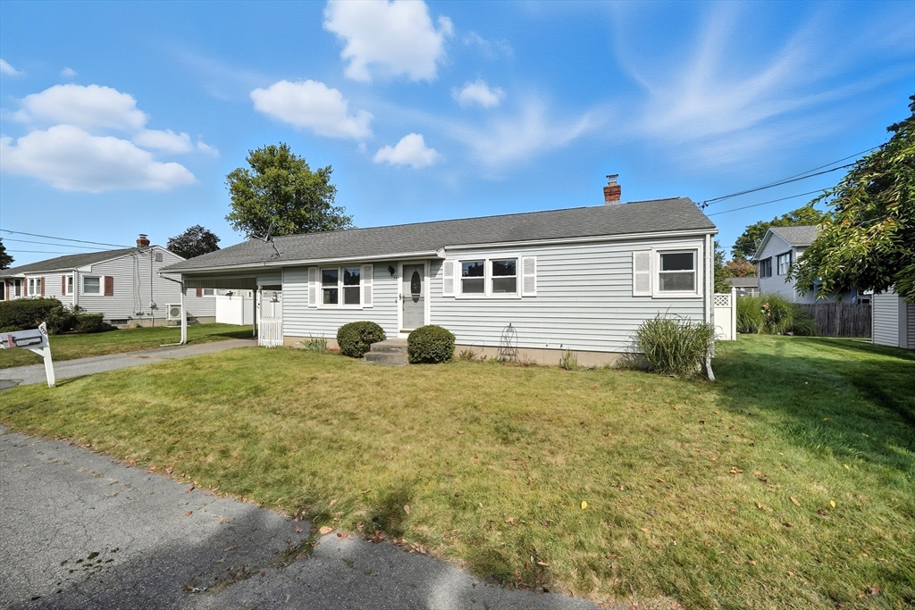 54 Dayton Street Chicopee, MA 01013 - Photo 2 of 25 a house view with a backyard space