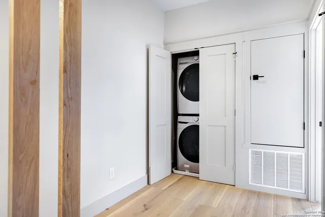 a view of a storage & utility room with a washer and dryer