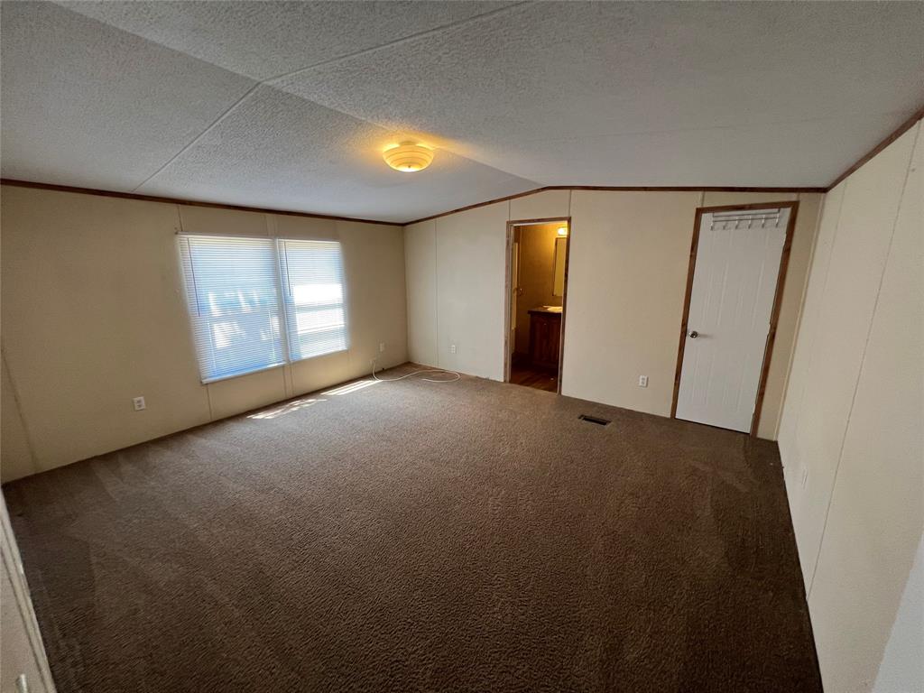 1647 Stonecrest Road Argyle, TX 76226 - Photo 14 of 16 an empty room with windows