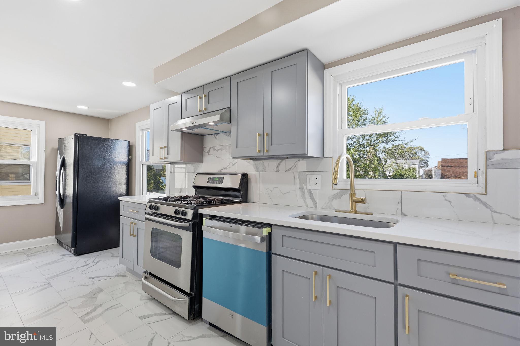 1853 Merlin Road Philadelphia, PA 19116 - Photo 12 of 41 Modern kitchen with sleek finishes.