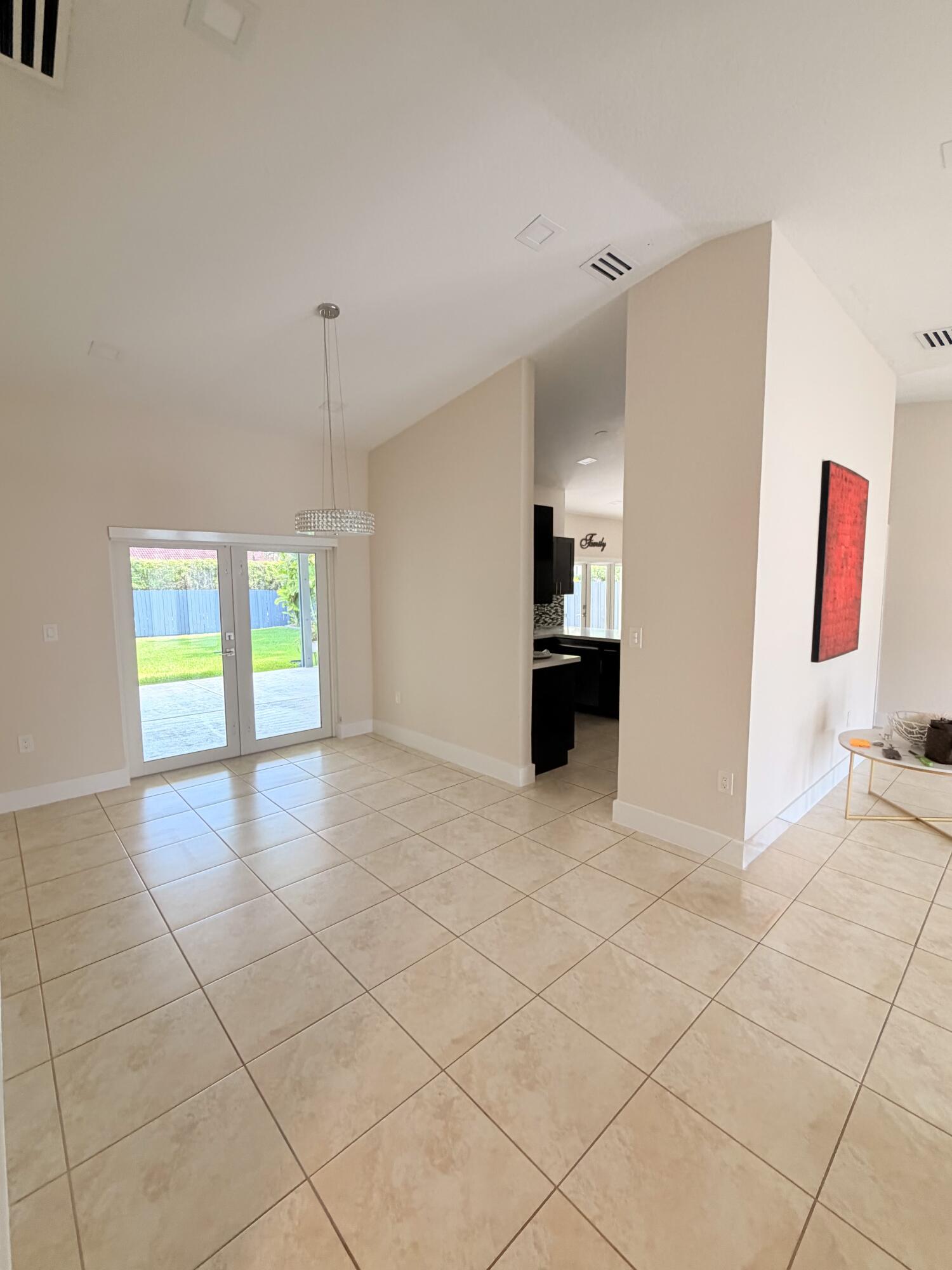 13066 Southwest 218th Terrace Miami, FL 33170 - Photo 13 of 27 living room + glass door