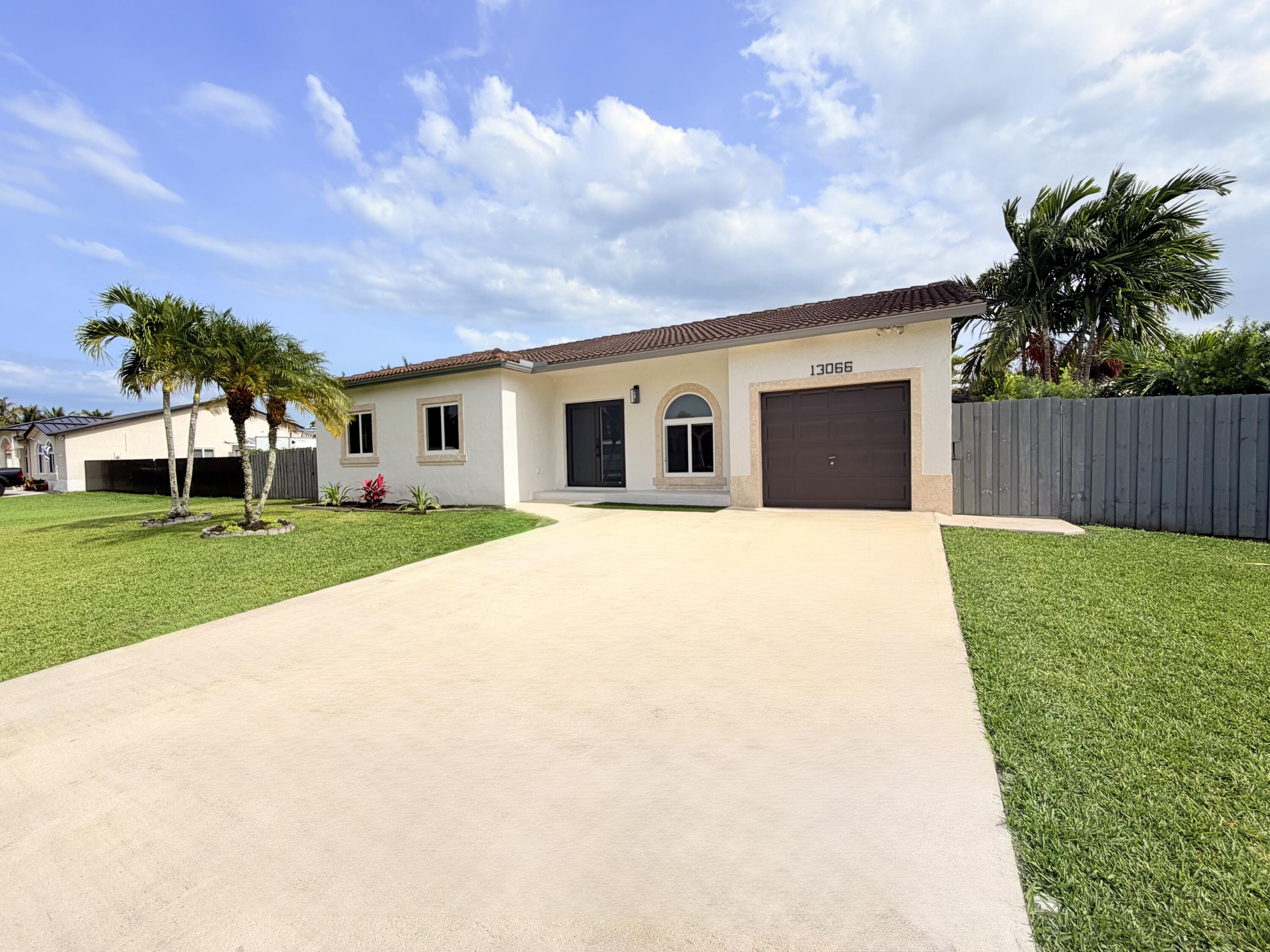 13066 Southwest 218th Terrace Miami, FL 33170 - Photo 2 of 27 outside 7
