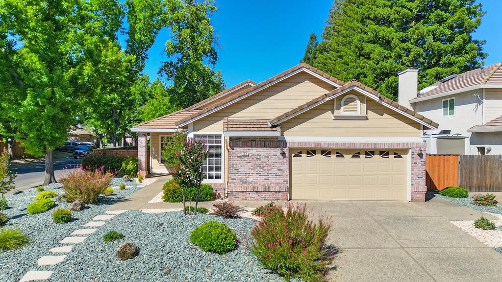107 Conductor Way Folsom, CA 95630 - Photo 1 of 1 a view of a house with a yard and potted plants