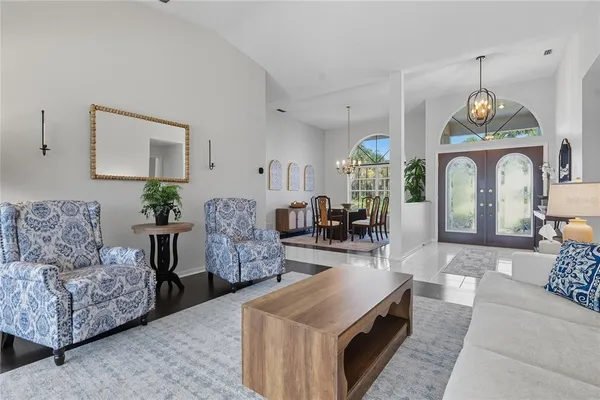 a kitchen with stainless steel appliances cabinets and a window