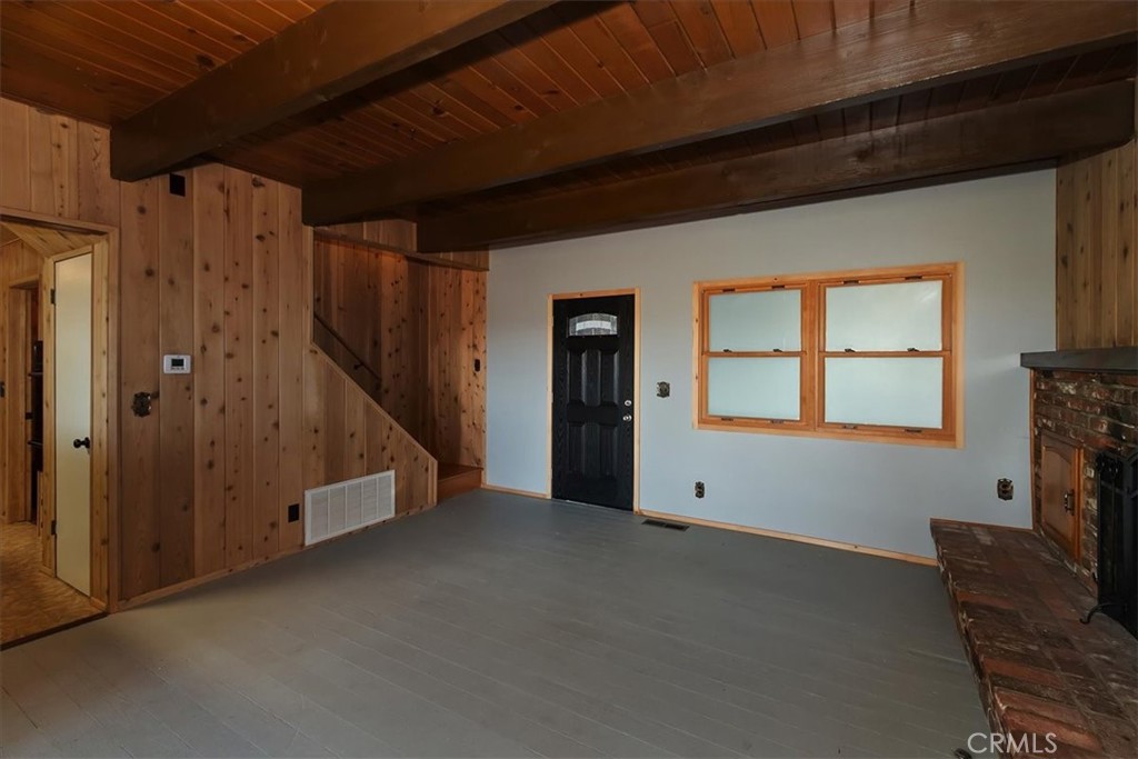 495 Kuffel Canyon Road Lake Arrowhead, CA 92352 - Photo 12 of 64 a view of an empty room with a window