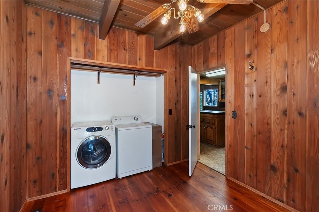 495 Kuffel Canyon Road Lake Arrowhead, CA 92352 - Photo 42 of 64 a view of a storage & utility room with wooden floor