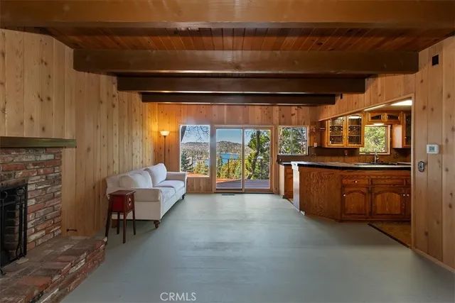 a living room with furniture and a gate