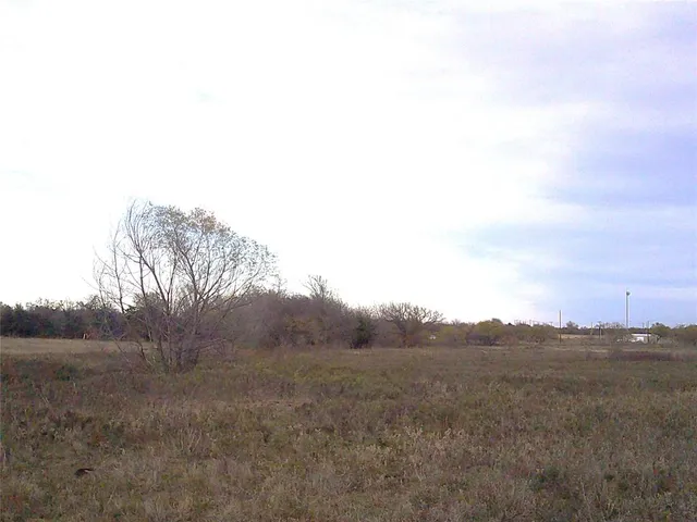a view of mountain view with trees