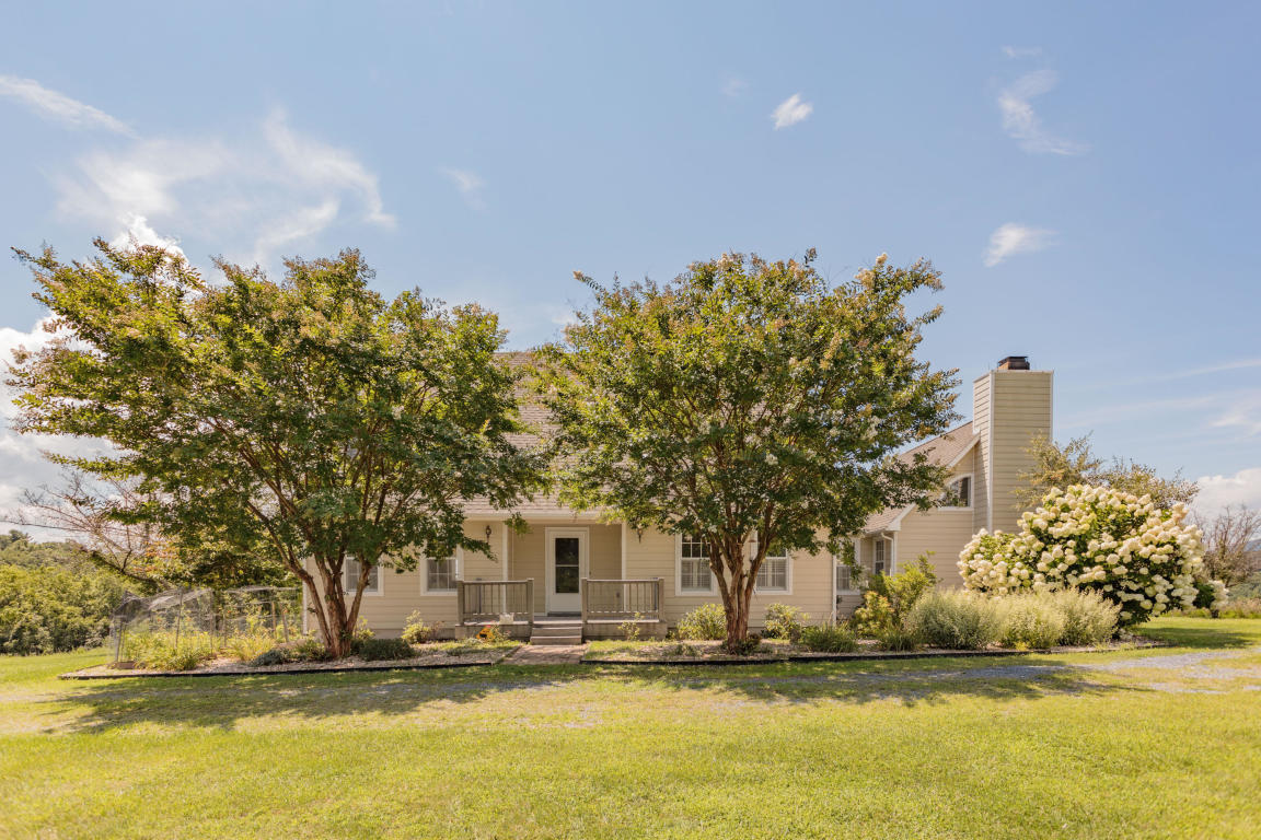 1236 Dutch Hollow Road Raphine, VA 24472 - Photo 2 of 45 a front view of a house with a garden