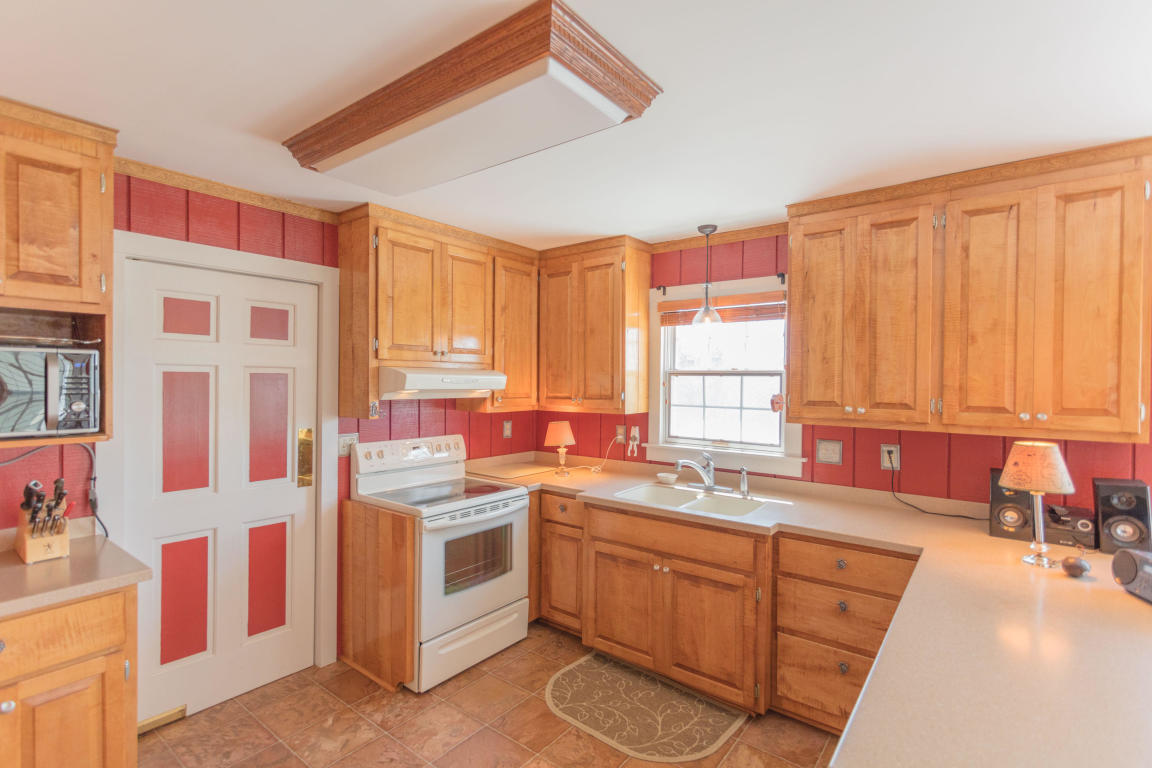 1236 Dutch Hollow Road Raphine, VA 24472 - Photo 23 of 45 a kitchen that has a sink and a stove in it