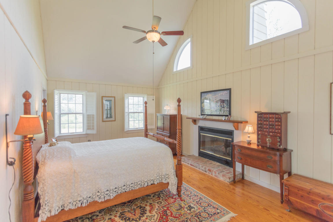 1236 Dutch Hollow Road Raphine, VA 24472 - Photo 24 of 45 a bedroom with a bed furniture and a window