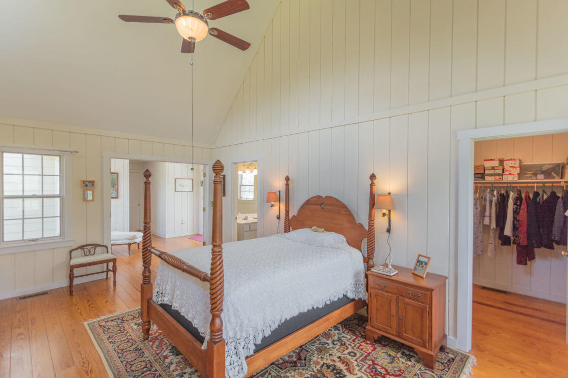 1236 Dutch Hollow Road Raphine, VA 24472 - Photo 25 of 45 a bedroom with furniture and wooden floor