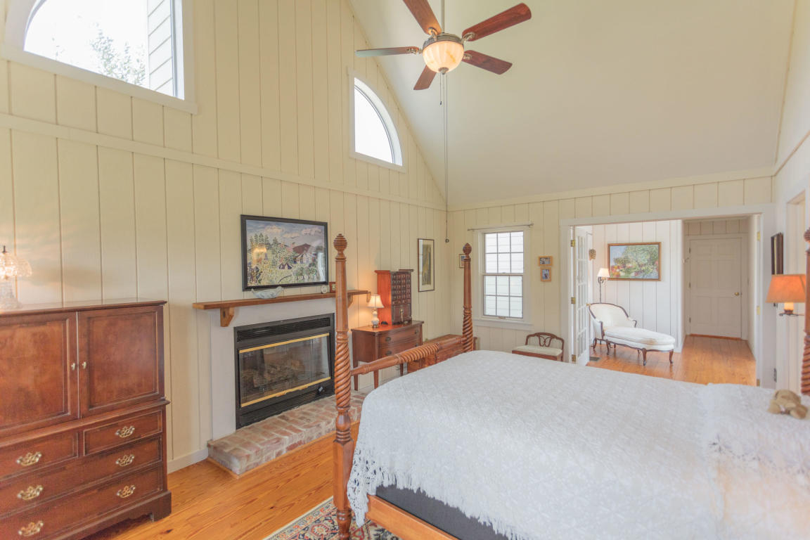 1236 Dutch Hollow Road Raphine, VA 24472 - Photo 26 of 45 a bed room with a bed and a television