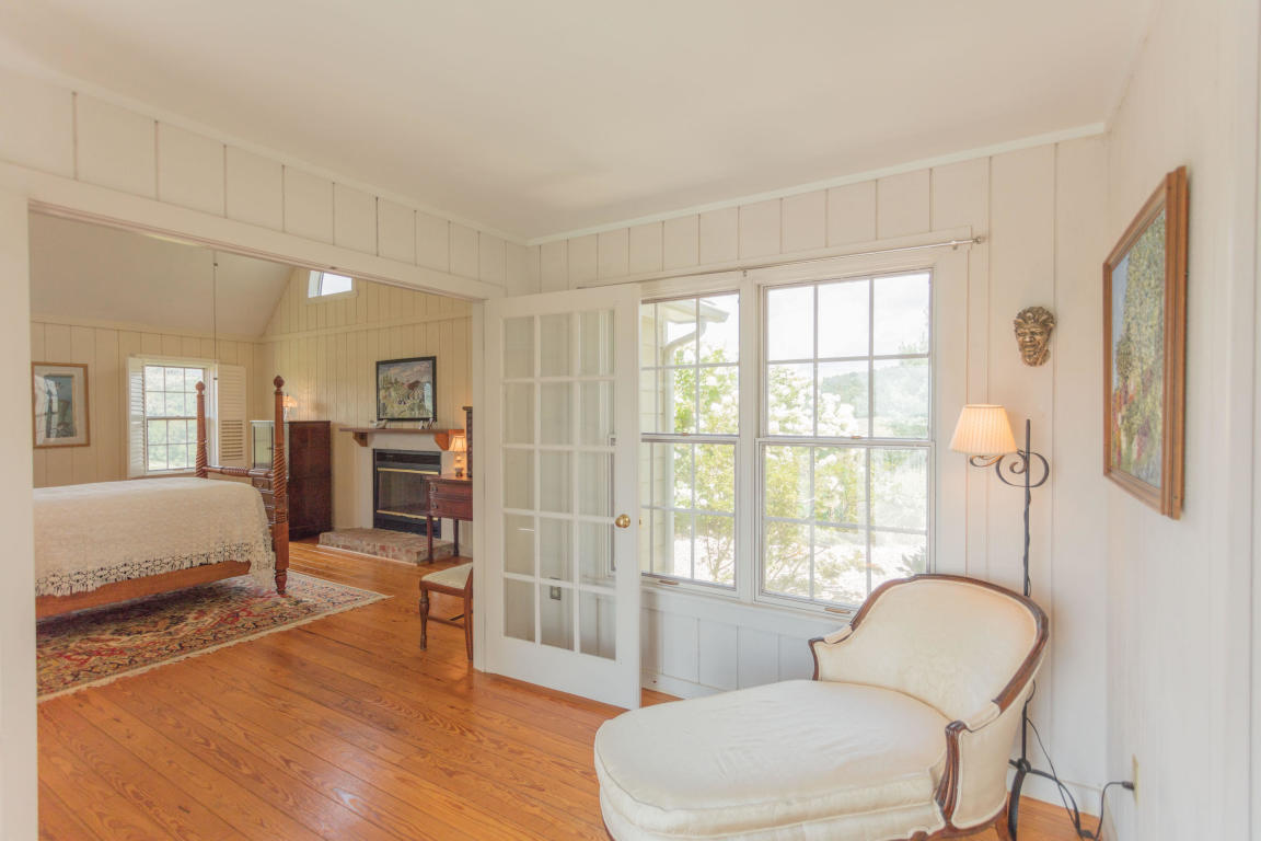 1236 Dutch Hollow Road Raphine, VA 24472 - Photo 27 of 45 a living room with furniture and a large window