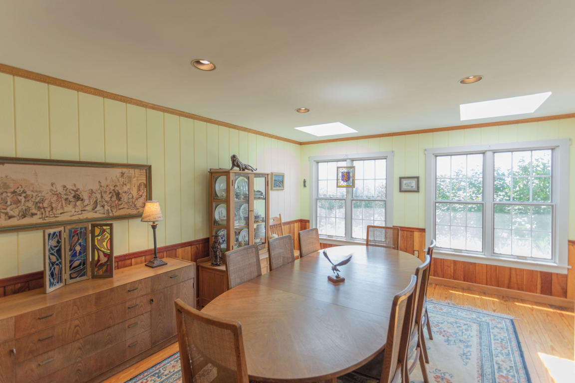 1236 Dutch Hollow Road Raphine, VA 24472 - Photo 28 of 45 a view of a dining room with furniture window and wooden floor