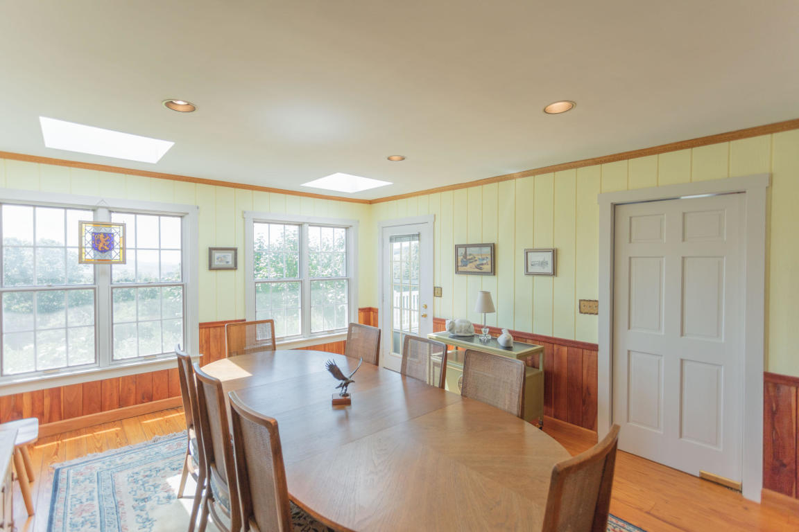 1236 Dutch Hollow Road Raphine, VA 24472 - Photo 29 of 45 a view of a dining room with furniture window and outside view