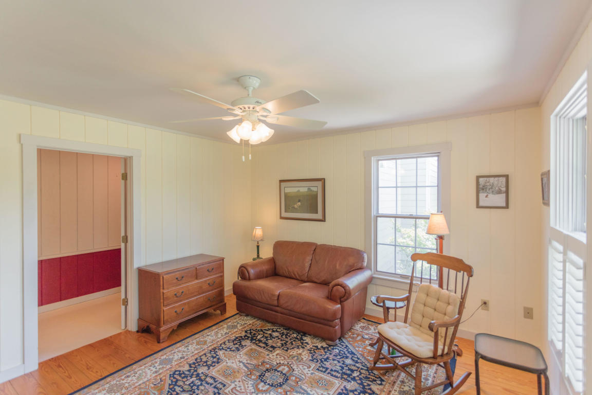 1236 Dutch Hollow Road Raphine, VA 24472 - Photo 33 of 45 a living room with furniture and a window