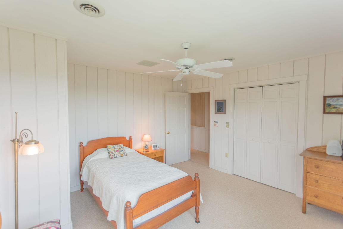 1236 Dutch Hollow Road Raphine, VA 24472 - Photo 41 of 45 a bedroom with a bed and a table
