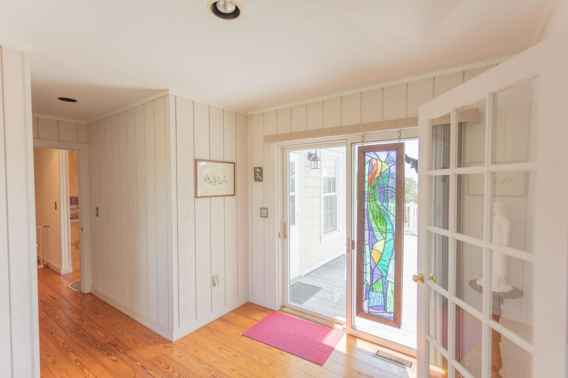 1236 Dutch Hollow Road Raphine, VA 24472 - Photo 45 of 45 a view of a room with wooden floor and windows
