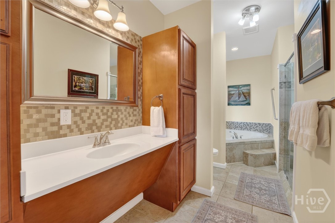 725 Youman's Road Midway, GA 31320 - Photo 18 of 71 Primary en-suite. Wheelchair accessible