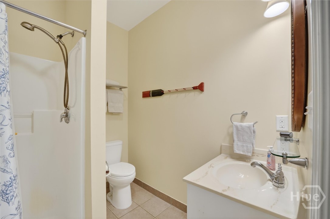 725 Youman's Road Midway, GA 31320 - Photo 28 of 71 Guest en-suite #2 with walk-in shower.