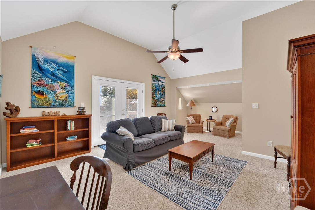 725 Youman's Road Midway, GA 31320 - Photo 35 of 71 Second floor family room with private balcony looking over the water.