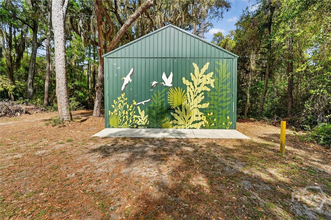 725 Youman's Road Midway, GA 31320 - Photo 52 of 71 24 x 48 workshop with custom painted mural.