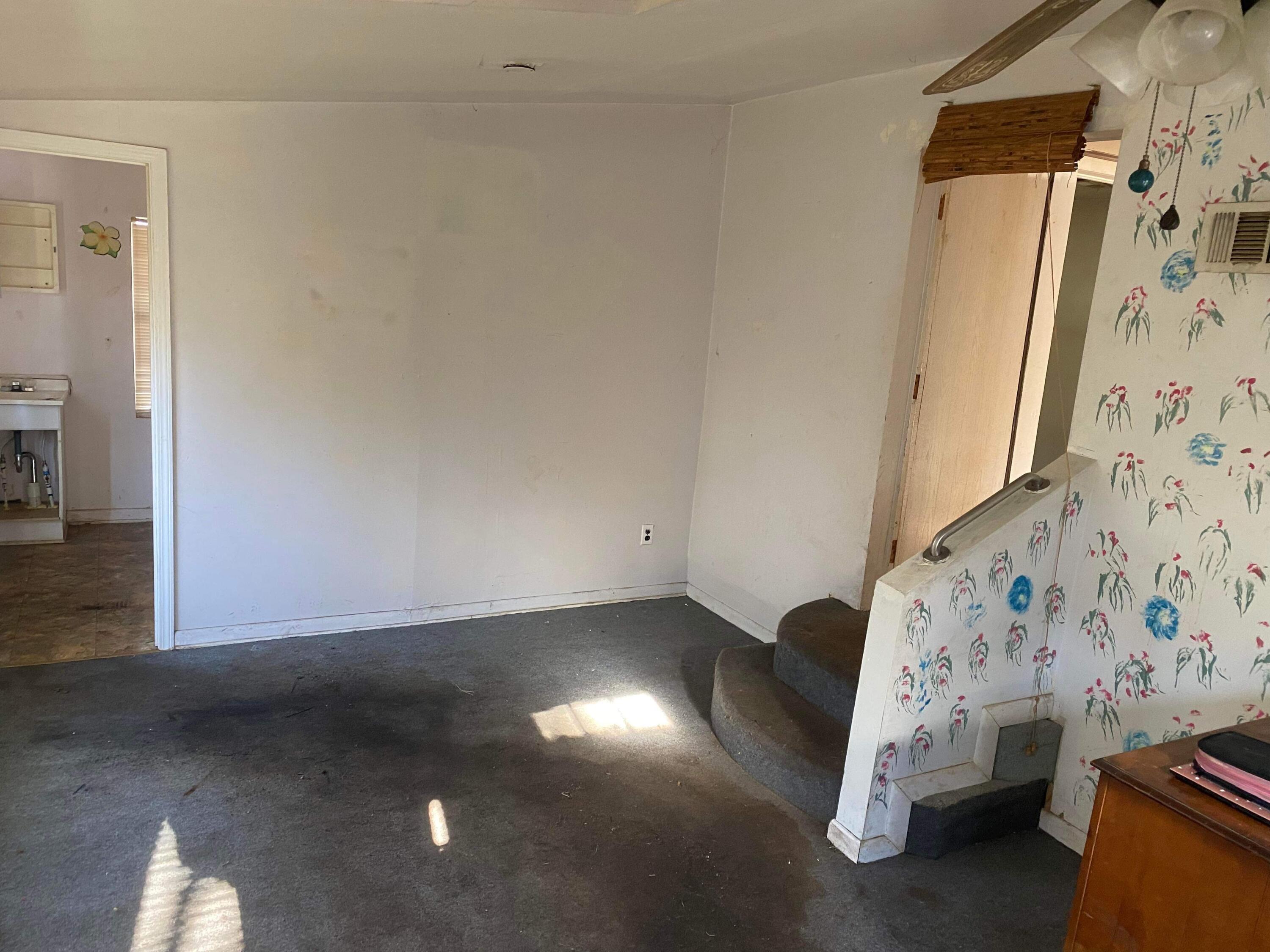 145 Live Oak Avenue West DeFuniak Springs, FL 32435 - Photo 6 of 25 a view of livingroom with furniture and window