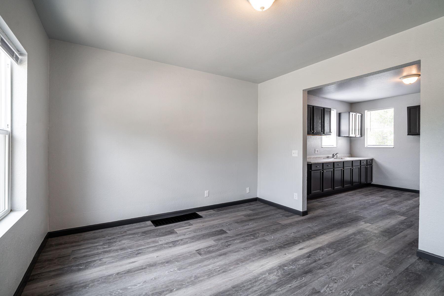 547 North 25th Street Milwaukee, WI 53233 - Photo 4 of 27 Living Room Opens to Kitchen