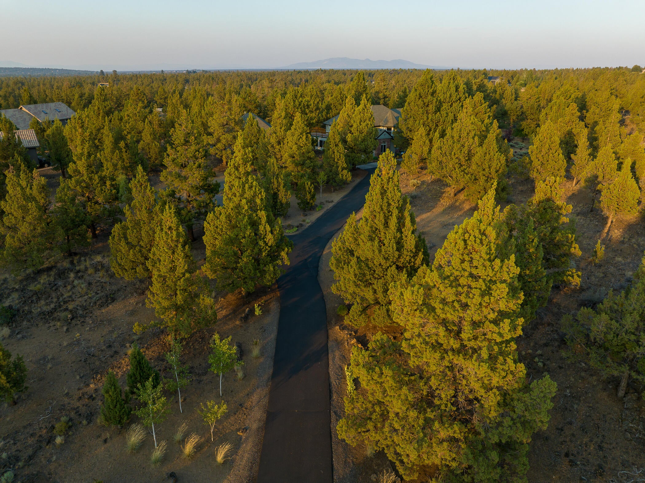 64300 Crosswinds Road Bend, OR 97703 - Photo 58 of 61 A paved driveway leading you from Crosswinds Road to your private oasis!