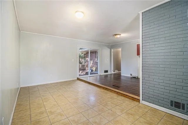 a view of a hallway with a chandelier