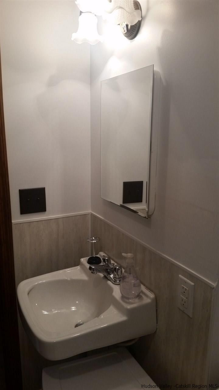 41 Denver Run Spur Roxbury, NY 12421 - Photo 20 of 27 a bathroom with a sink and a mirror