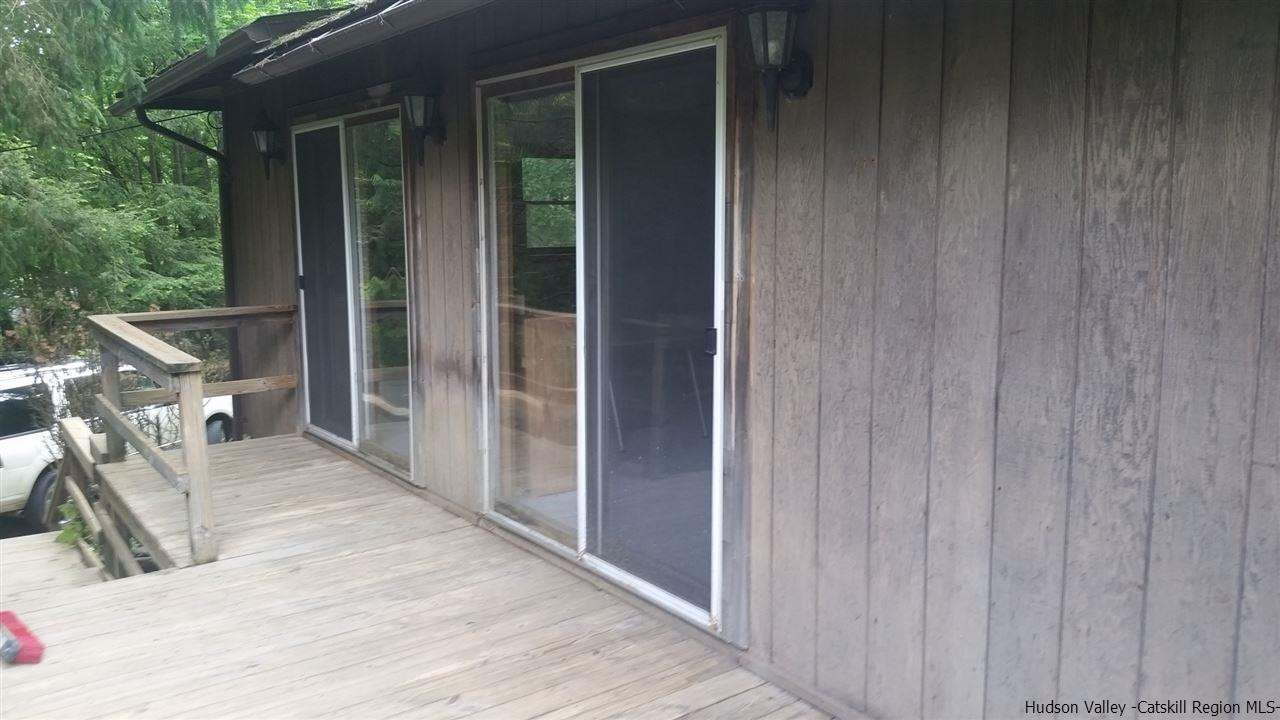 41 Denver Run Spur Roxbury, NY 12421 - Photo 5 of 27 a view of a house with backyard porch and sitting area