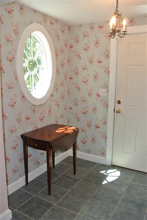 127 Grosvenor Road Needham, MA 02492 - Photo 9 of 21 a bathroom with a sink a mirror and a shower