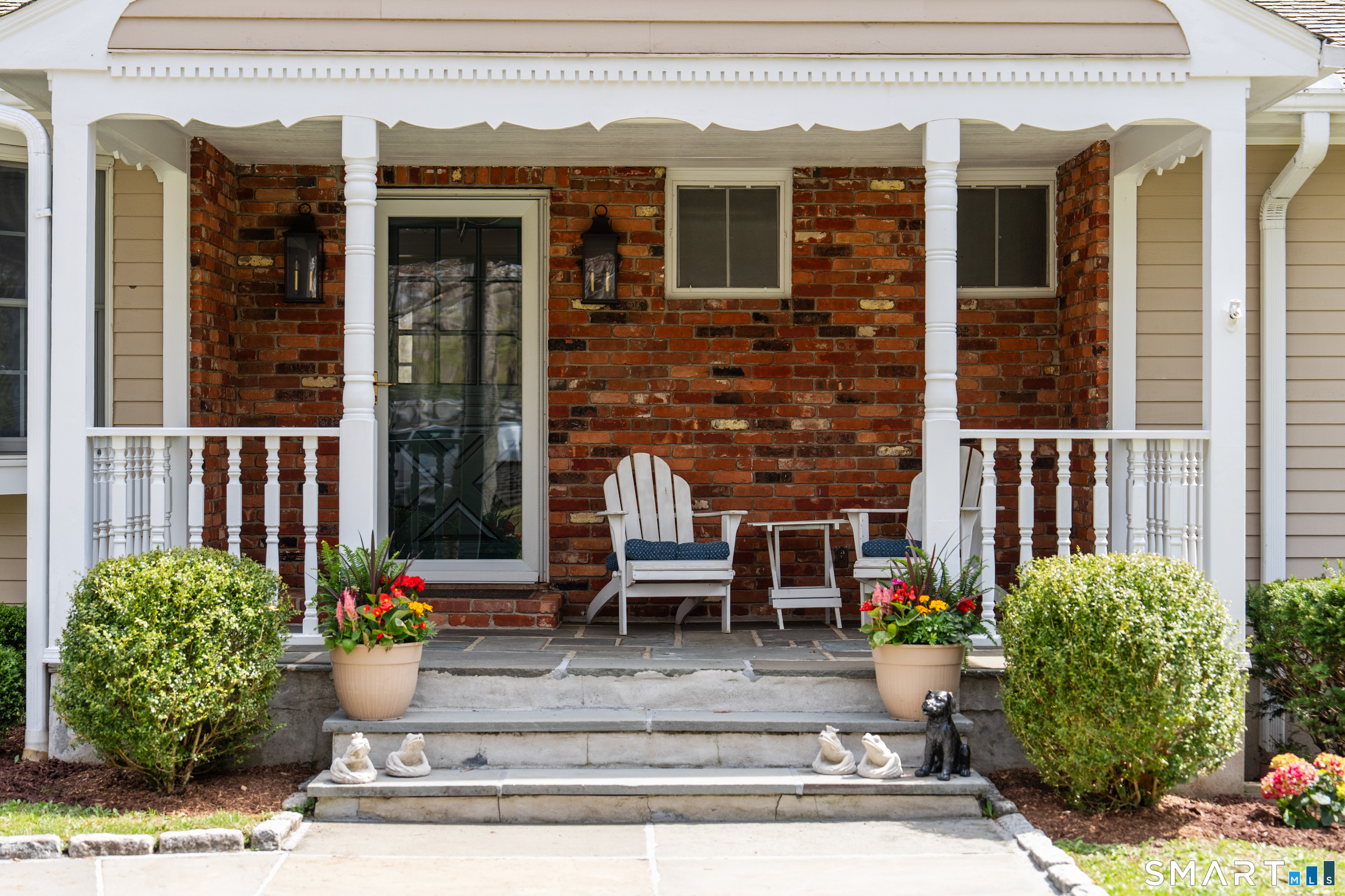 224 Marvin Ridge Road New Canaan, CT 06840 - Photo 3 of 36 a view of a house with potted plants