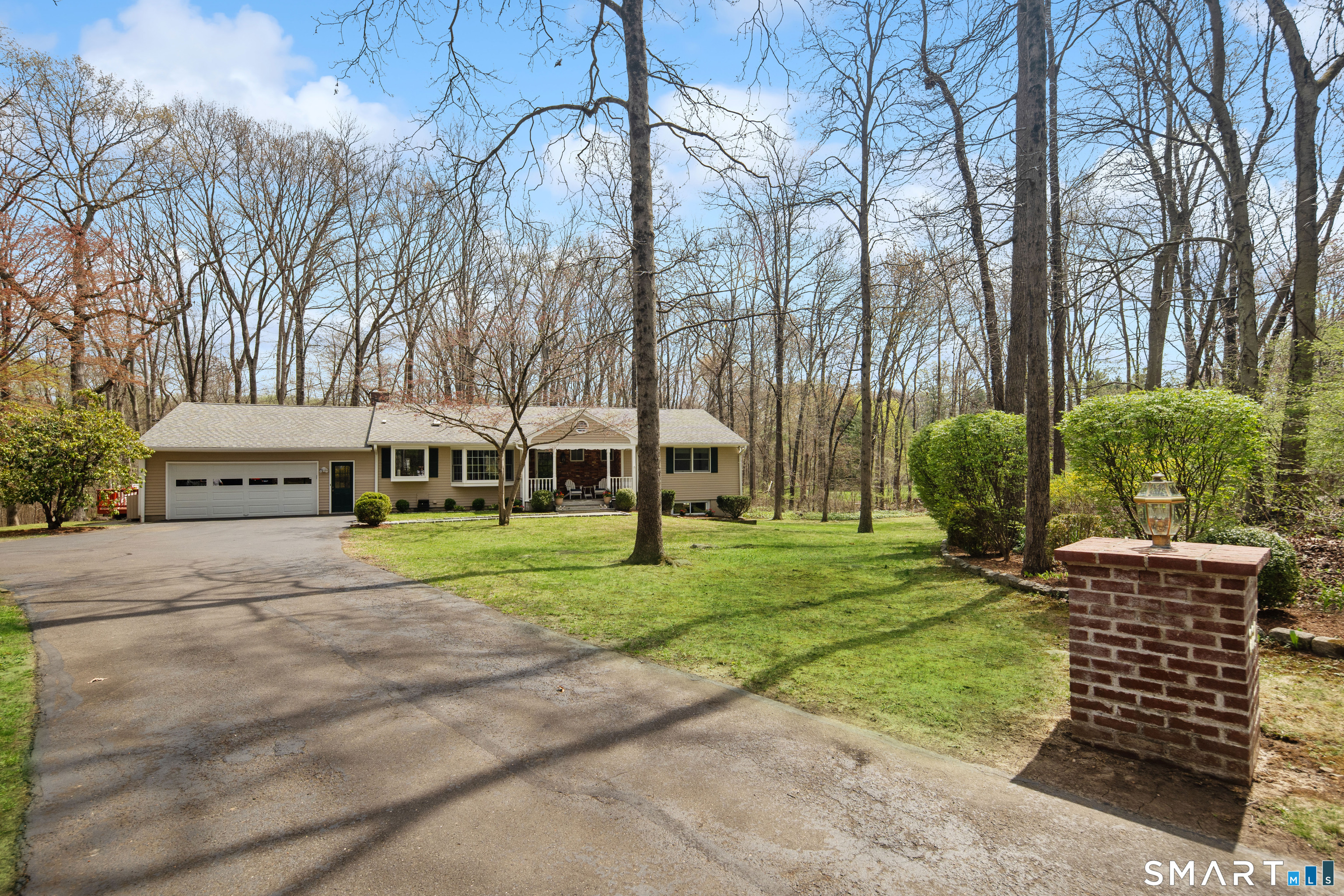 224 Marvin Ridge Road New Canaan, CT 06840 - Photo 4 of 36 a view of a house with a yard and pathway