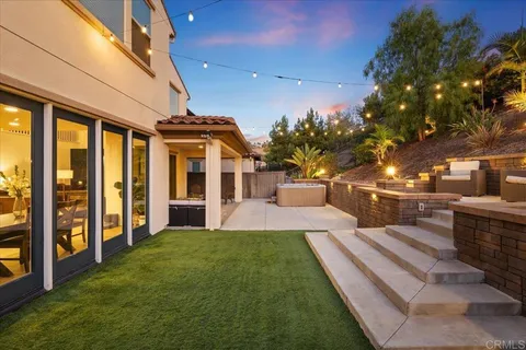 a view of a house with a street