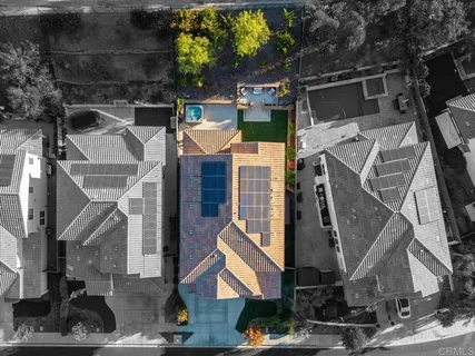 an aerial view of residential building with parking space