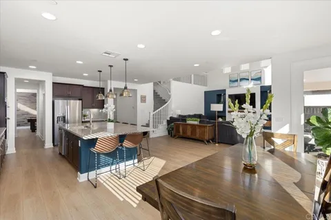 a large kitchen with lots of counter space and windows