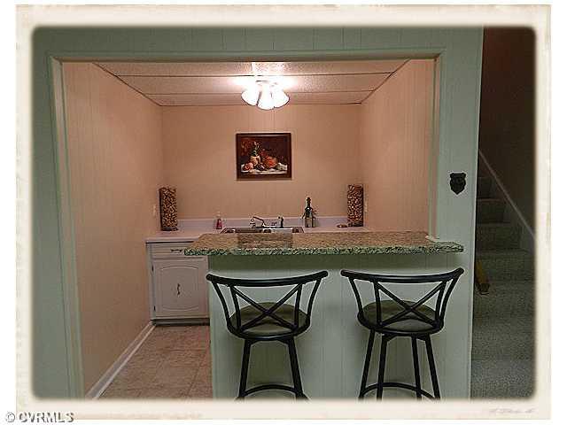 8628 Trabue Road Richmond, VA 23235 - Photo 20 of 24 Den/Family/Great Room - Wet Bar off the basement Family room