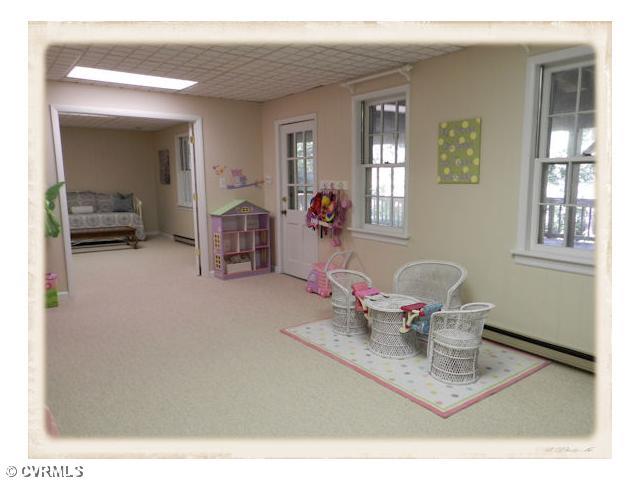 8628 Trabue Road Richmond, VA 23235 - Photo 21 of 24 Other - Plenty of play space is found in the full daylight walk out basement