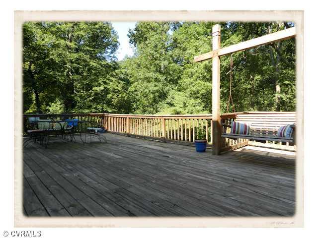 8628 Trabue Road Richmond, VA 23235 - Photo 23 of 24 Patio/Deck - Lots of outdoor entertaining space on the open deck complete with a built in swing!
