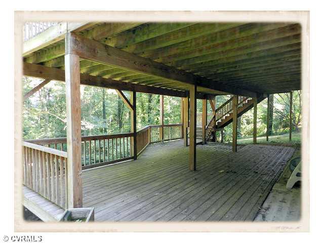 8628 Trabue Road Richmond, VA 23235 - Photo 24 of 24 Patio/Deck - Shady quiet space with beautiful natural views can be found on the covered deck right off the basement great room.