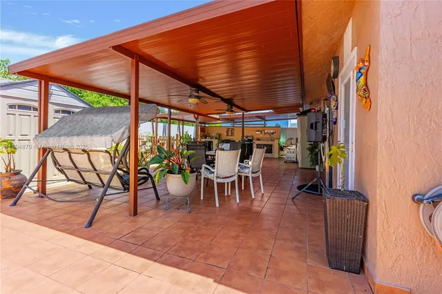 a view of a car park in front of house