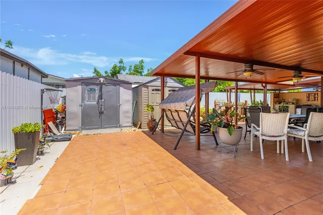 a view of living room with furniture and air hockey table
