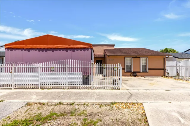 a view of a house with a patio